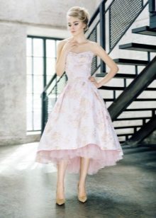 Short front long back dress in the style of style