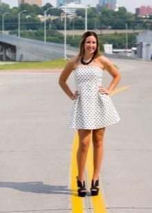 White pea dress in black polka dot with a high waist