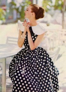 Black dress with white polka dots in retro style