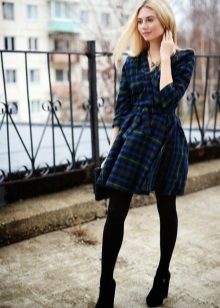 Medium length in a green and blue check dress