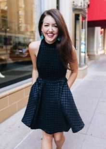 Black dress in a black checkered skirt half sun