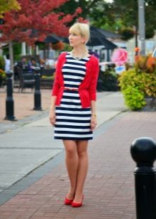 Red ballet flats and a black and white striped cardigan dress