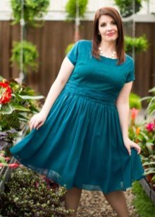 Casual celadon light dress of medium length for full