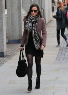 Casual dress in combination with a scarf and a warm jacket