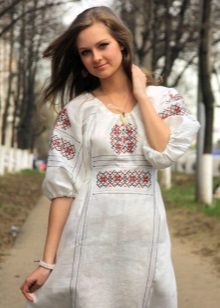 Modern Russian dress in ethnic style and ornaments for it