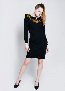 Knitted dress decorated with embroidery