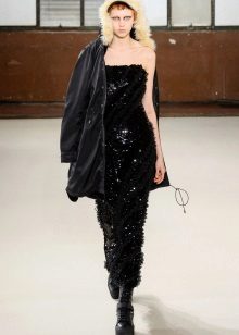 The choice of outerwear under a strapless dress