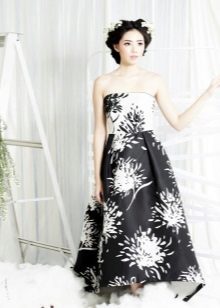 Black and white strapless dress with a print