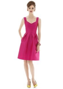 Dress on straps with a bell skirt