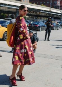 Burgundy dress with a print with a skirt the sun