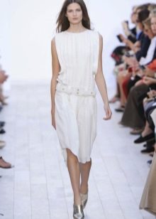 White dress with low waist and medium length