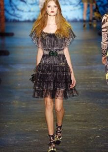 Fashionable translucent dress of spring-summer 2016 with flounce