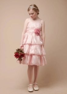 A multi-tiered dress in retro style for a girl of 11 years