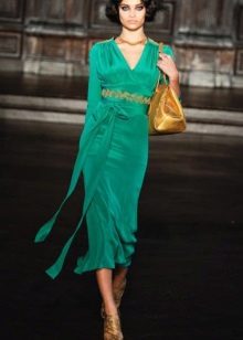 Gold embellishment to green midi dress