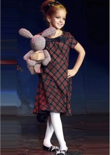 School dress for girls in a cage