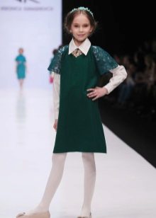Knitted green dress for the girl