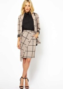 Asymmetrical skirt with a turtleneck and an office jacket