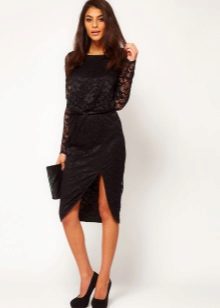 Asymmetrical skirt and black clutch