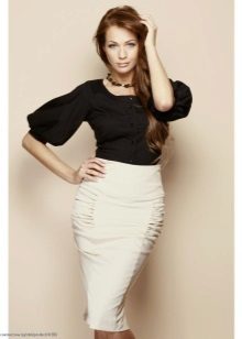 white pencil skirt and blouse with a lush sleeve
