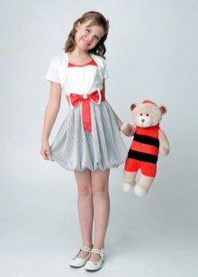 Hairstyle for a cocktail dress for a girl