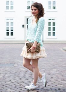 Layered mini skirt with sneakers