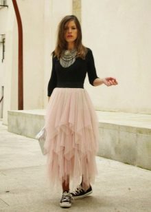 Long layered skirt in combination with sneakers