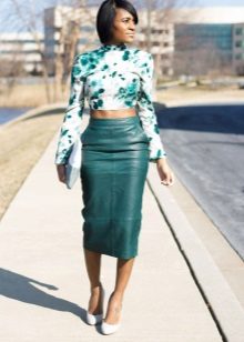 Green leather pencil skirt with a white floral print blouse
