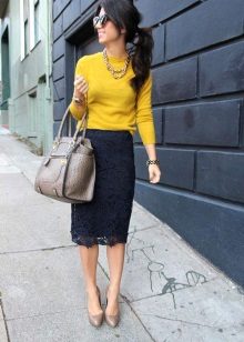 Black lace pencil skirt with bright top