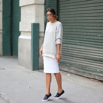 White pencil skirt with black sneakers and gray sweatshirt