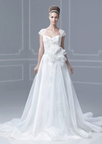 Wedding dress with a laid on skirt lacy