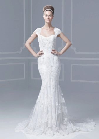 Wedding dress with a laid on skirt lacy
