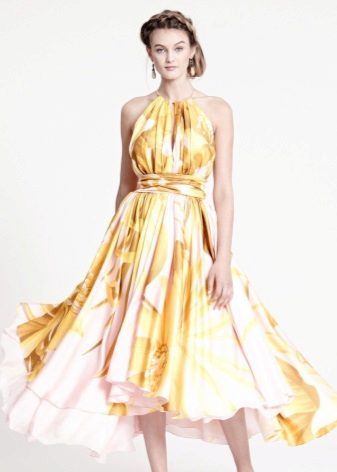 Yellow evening dress with a print