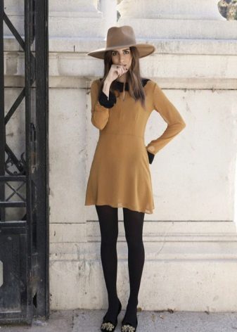 Mustard dress with black tights