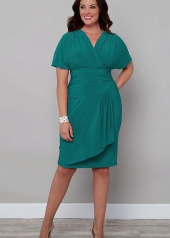 Medium length dress with draping belly-covering
