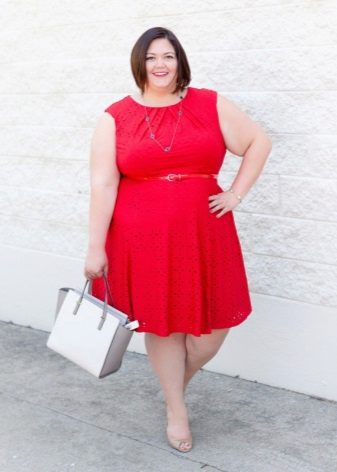 Red sleeveless dress for obese women with an A-shaped silhouette under the strap in red
