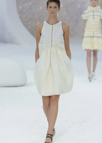 White dress from Chanel with an American armhole