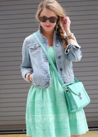 Denim jacket under a mint dress