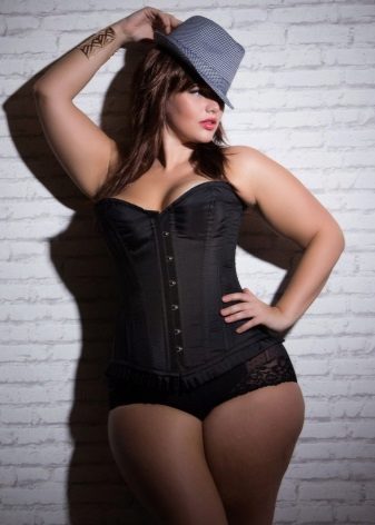 Corrective underwear (corset) under the long dress for a full girl