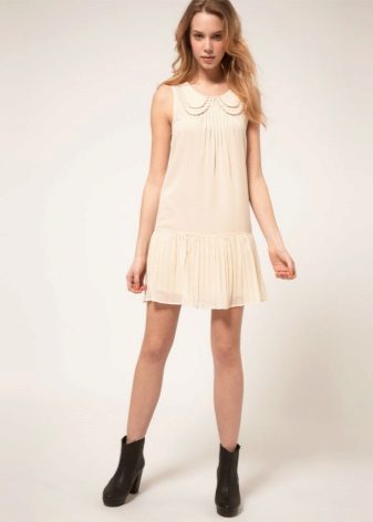 Dress with a pleated skirt for an inverted triangle type figure