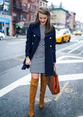 Coat and boots to a striped dress