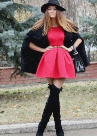 Short full skirt in combination with boots