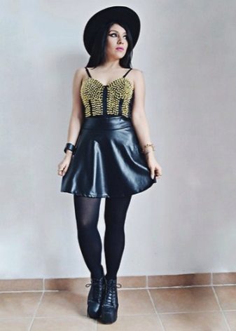 Leather skirt with a sun hat and tank top and high wedge boots