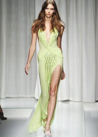 Long green dress with a slit