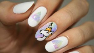 Unusual design manicure with a unicorn