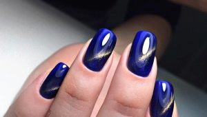 Manicure cat eye in blue shades
