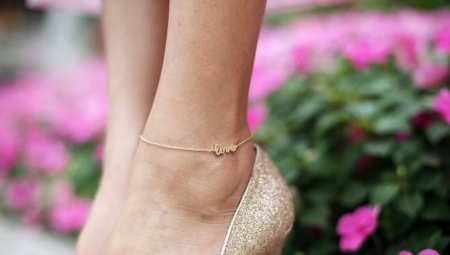 Gold bracelet on foot