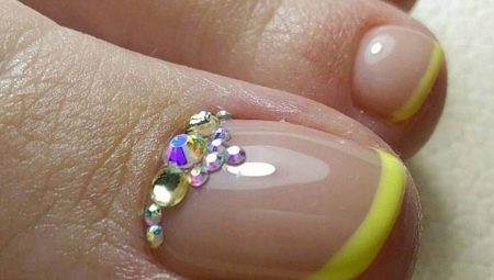 Beautiful pedicure french with rhinestones