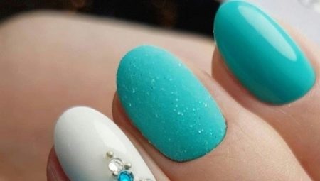 Manicure design features in turquoise tones