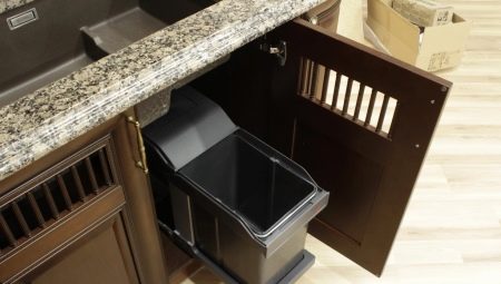 Retractable bins under the sink