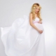 How to choose a wedding dress for pregnant brides?